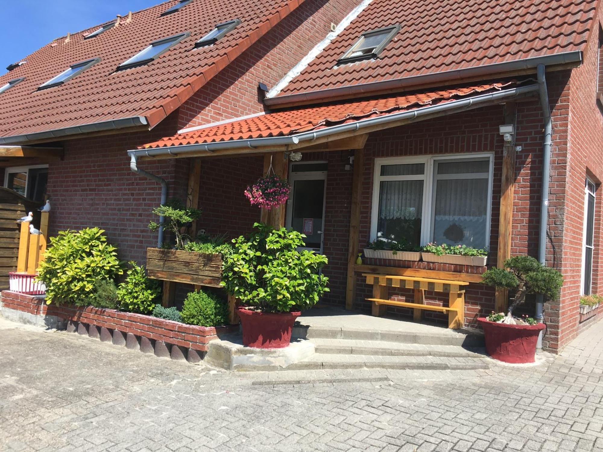 Garni Hotel-Pension Holum Neuharlingersiel Esterno foto