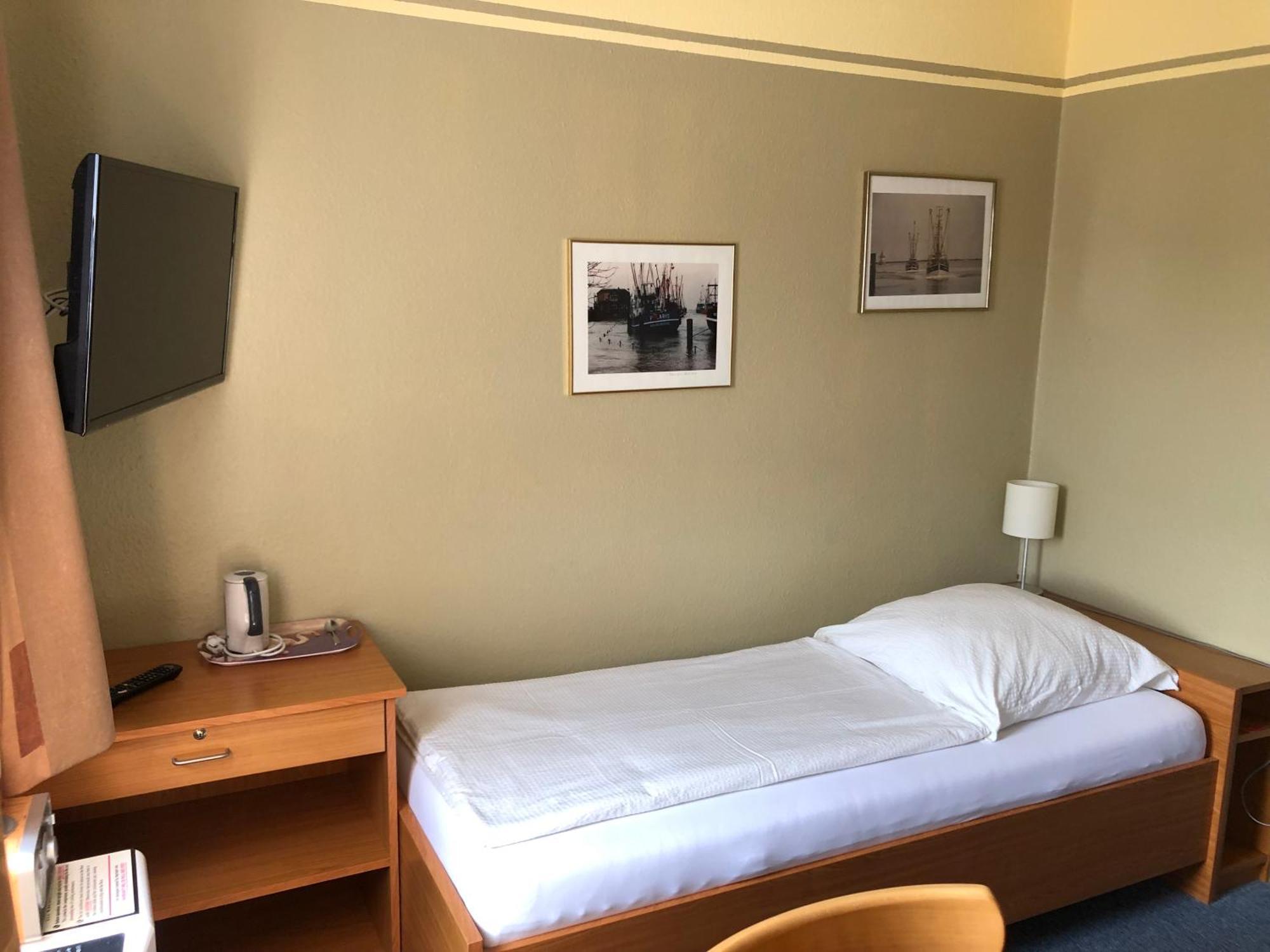 Garni Hotel-Pension Holum Neuharlingersiel Esterno foto